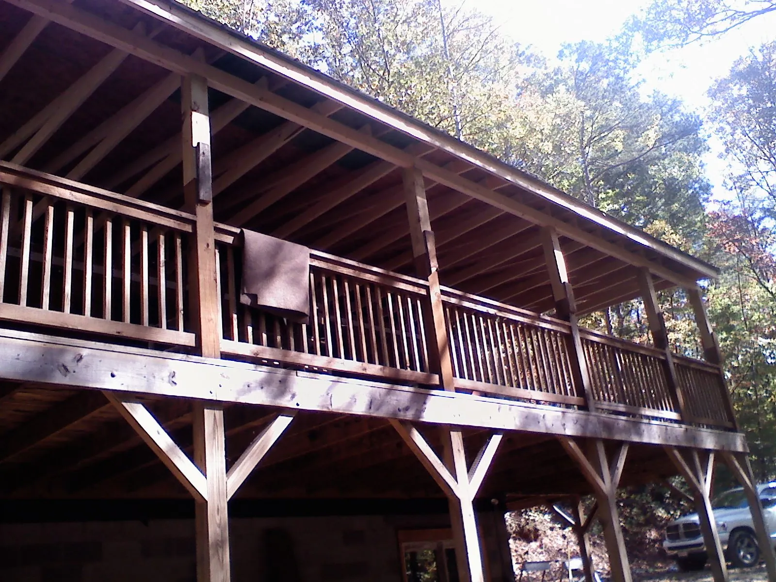 Timber framing under a new elevated porch and deck — Roof Leak Repair in New Tazewell by Roofing Brothers
